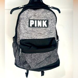 PINK backpack. Three big and one small compartment.